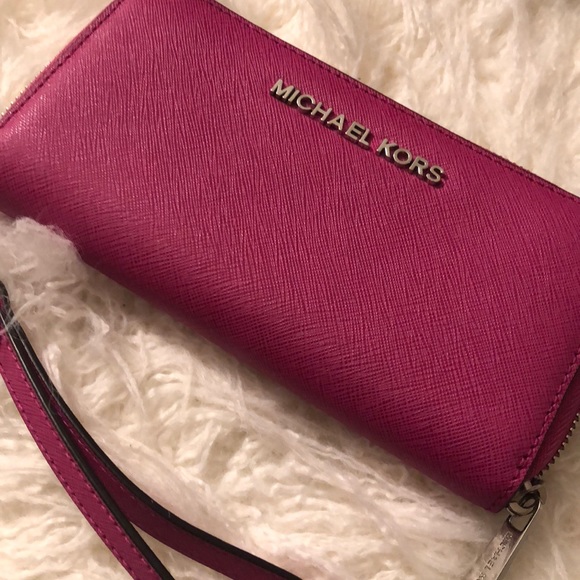 Michael Kors Handbags - MICHAEL KORS hot pink leather wristlet